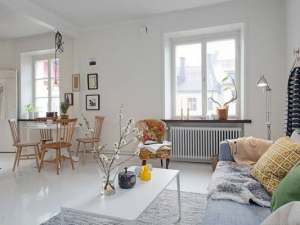 60平北欧风格两居室卧室实木地板装修效果图  简约素色风